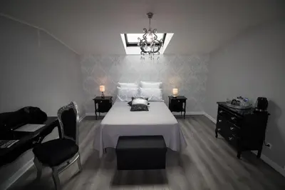 Un ou plusieurs lits dans un hébergement de l'établissement Chambres d hôtes au Domaine de Robert