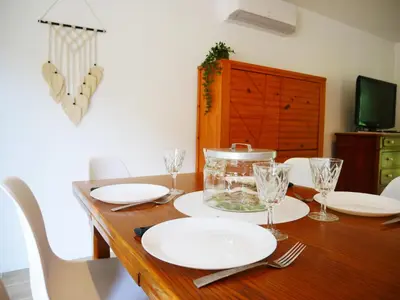 Télévision ou salle de divertissement dans l'établissement Gîte de June