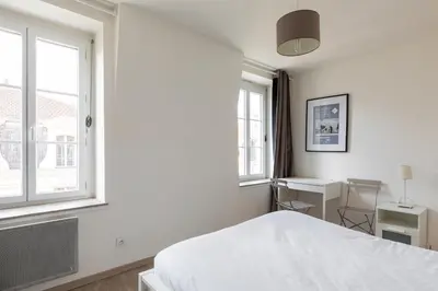 Un ou plusieurs lits dans un hébergement de l'établissement DIFY Palais - Cordeliers