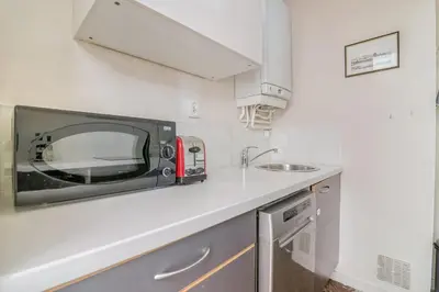 Cuisine ou kitchenette dans l'établissement GuestReady - Superbe T3 en hyper-centre - belles vues