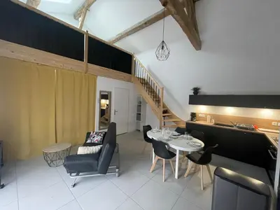 Coin salon dans l'établissement Le Clos Du Jardin