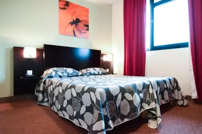 Un ou plusieurs lits dans un hébergement de l'établissement Residhotel Lyon Lamartine