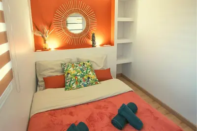 Un ou plusieurs lits dans un hébergement de l'établissement KASA HOME - Calme, Cosy, WIFI & Netflix