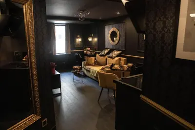 Coin salon dans l'établissement Superbe Appartement avec Jacuzzi...