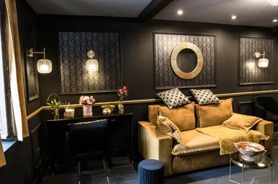 Coin salon dans l'établissement Superbe Appartement avec Jacuzzi...
