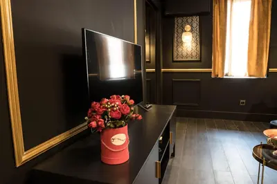 Télévision ou salle de divertissement dans l'établissement Superbe Appartement avec Jacuzzi...