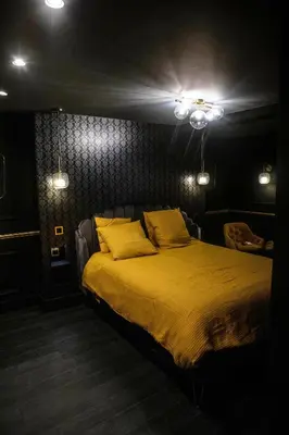 Un ou plusieurs lits dans un hébergement de l'établissement Superbe Appartement avec Jacuzzi...