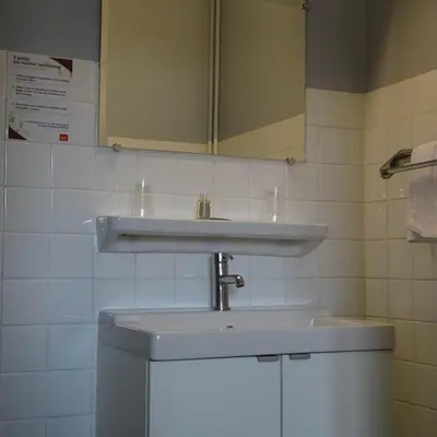 Salle de bains dans l'établissement Europa Hotel
