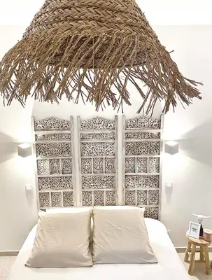 Un ou plusieurs lits dans un hébergement de l'établissement L’Escale - Le Boho + garage + NETFLIX