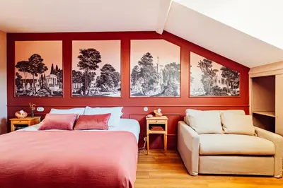 Un ou plusieurs lits dans un hébergement de l'établissement Hôtel Maison Lacassagne Lyon