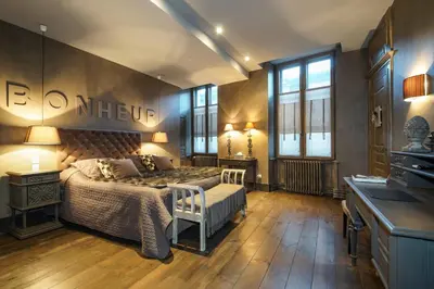 Un ou plusieurs lits dans un hébergement de l'établissement Hôtel de la Tour