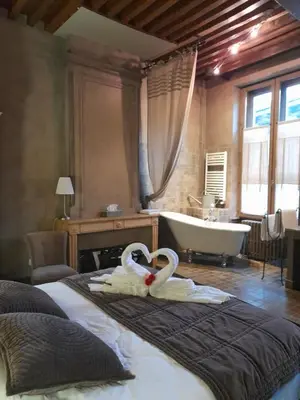 Un ou plusieurs lits dans un hébergement de l'établissement Hôtel de la Tour