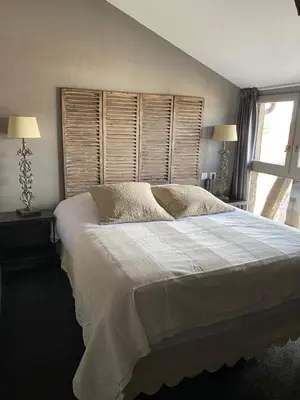 Un ou plusieurs lits dans un hébergement de l'établissement Hôtel de la Tour