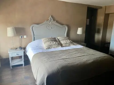 Un ou plusieurs lits dans un hébergement de l'établissement Hôtel de la Tour
