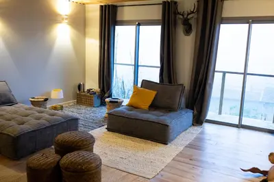 Coin salon dans l'établissement L'ABRI du château SPA et détente