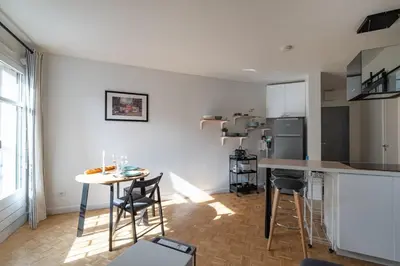 Cuisine ou kitchenette dans l'établissement GuestReady - T1 BIS - Cosy and Lovely