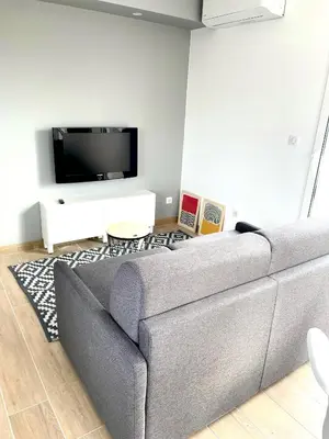 Télévision ou salle de divertissement dans l'établissement La Parenthèse Balnéo T2 Cosy de 40m² avec terrasse