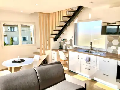 Cuisine ou kitchenette dans l'établissement La Parenthèse Balnéo T2 Cosy de 40m² avec terrasse