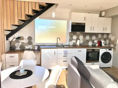 Cuisine ou kitchenette dans l'établissement La Parenthèse Balnéo T2 Cosy de 40m² avec terrasse