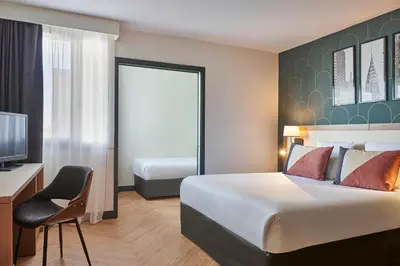 Un ou plusieurs lits dans un hébergement de l'établissement Hotel Gatsby by HappyCulture