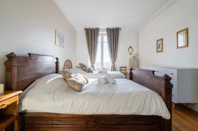 Un ou plusieurs lits dans un hébergement de l'établissement LA SUITE MARCELLIN - Magnifique T3 avec garage et balcon Lyon 7