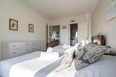 Un ou plusieurs lits dans un hébergement de l'établissement LA SUITE MARCELLIN - Magnifique T3 avec garage et balcon Lyon 7