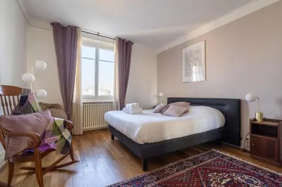 Un ou plusieurs lits dans un hébergement de l'établissement LA SUITE MARCELLIN - Magnifique T3 avec garage et balcon Lyon 7