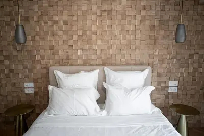 Un ou plusieurs lits dans un hébergement de l'établissement Suite Georgia - appartement 2 personnes - Check in h24 & Wifi