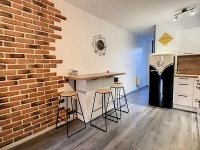 Cuisine ou kitchenette dans l'établissement Le Temps d'une Pause