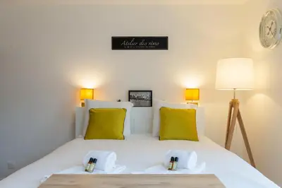 Un ou plusieurs lits dans un hébergement de l'établissement GuestReady - Studio Gerland neuf avec terrasse