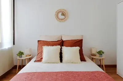 Un ou plusieurs lits dans un hébergement de l'établissement Appartement Cosy du Gier