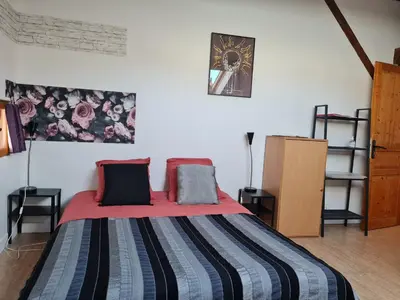 Un ou plusieurs lits dans un hébergement de l'établissement Espace Beléverte Bussière 1 Tamaris appartement meublé de 2 chambres