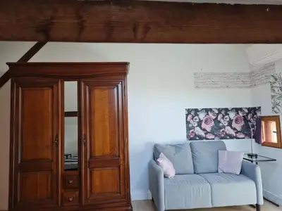 Coin salon dans l'établissement Espace Beléverte Bussière 1 Tamaris appartement meublé de 2 chambres