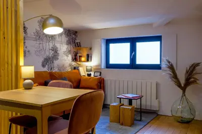 Coin salon dans l'établissement HONORÊ - Suite Terracotta