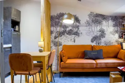Coin salon dans l'établissement HONORÊ - Suite Terracotta
