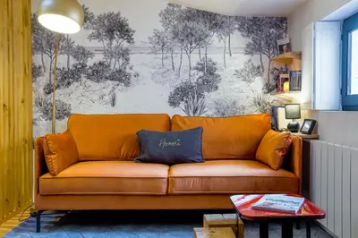 Coin salon dans l'établissement HONORÊ - Suite Terracotta