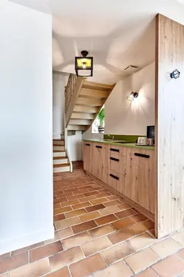 Cuisine ou kitchenette dans l'établissement La Suite