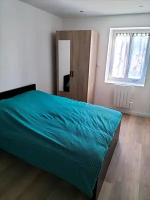 Un ou plusieurs lits dans un hébergement de l'établissement Appartement 2 pièces