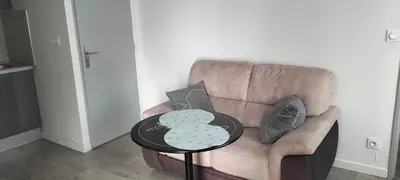 Coin salon dans l'établissement Appartement 2 pièces