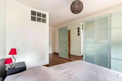 Un ou plusieurs lits dans un hébergement de l'établissement Le Lanterne - Place des Terreaux 2 Bedrooms