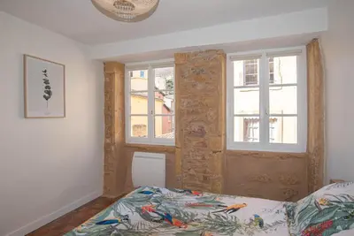 Un ou plusieurs lits dans un hébergement de l'établissement All in Lyon | Moderne et cosy au cœur de St-Jean