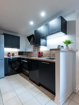 Cuisine ou kitchenette dans l'établissement CABANA & Le Saint Amour - Centre-Ville