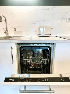 Cuisine ou kitchenette dans l'établissement La Bulle de Champagne