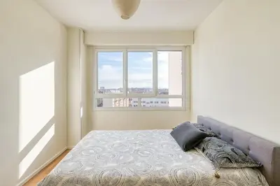 Un ou plusieurs lits dans un hébergement de l'établissement Superbe Apart 2 rooms lumineaux parking Casa Lyon