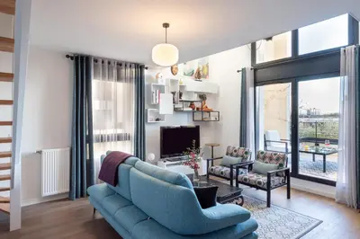 Coin salon dans l'établissement Vill'Arborea - Magnifique T3 au coeur du 7ème