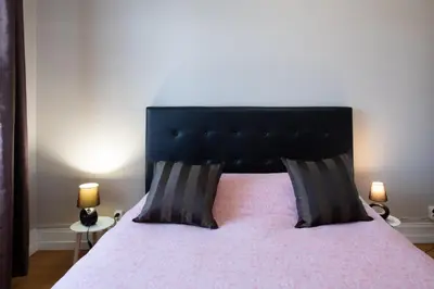 Un ou plusieurs lits dans un hébergement de l'établissement Le Saint Mo' - Joli appartement tout confort au coeur de Monplaisir