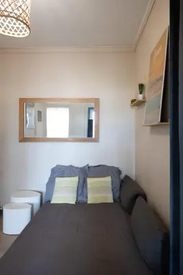 Un ou plusieurs lits dans un hébergement de l'établissement Le Saint Mo' - Joli appartement tout confort au coeur de Monplaisir