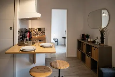 Cuisine ou kitchenette dans l'établissement Le Bollier - Charmant appartement au calme