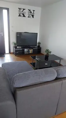 Télévision ou salle de divertissement dans l'établissement K&N - Maison à partager avec d'autres voyageurs - Chambre privée - Jardin - Balcon