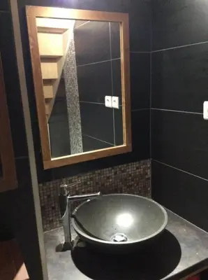 Salle de bains dans l'établissement Maison Auguste